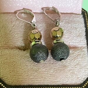 Gold and silver dangler earrings